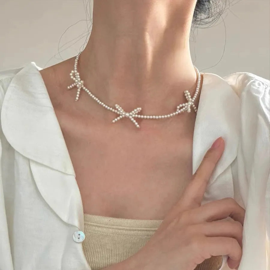 Sweet bow pearl necklace for women simple design clavicle chain white imitation pearls adjustable 31-40cm