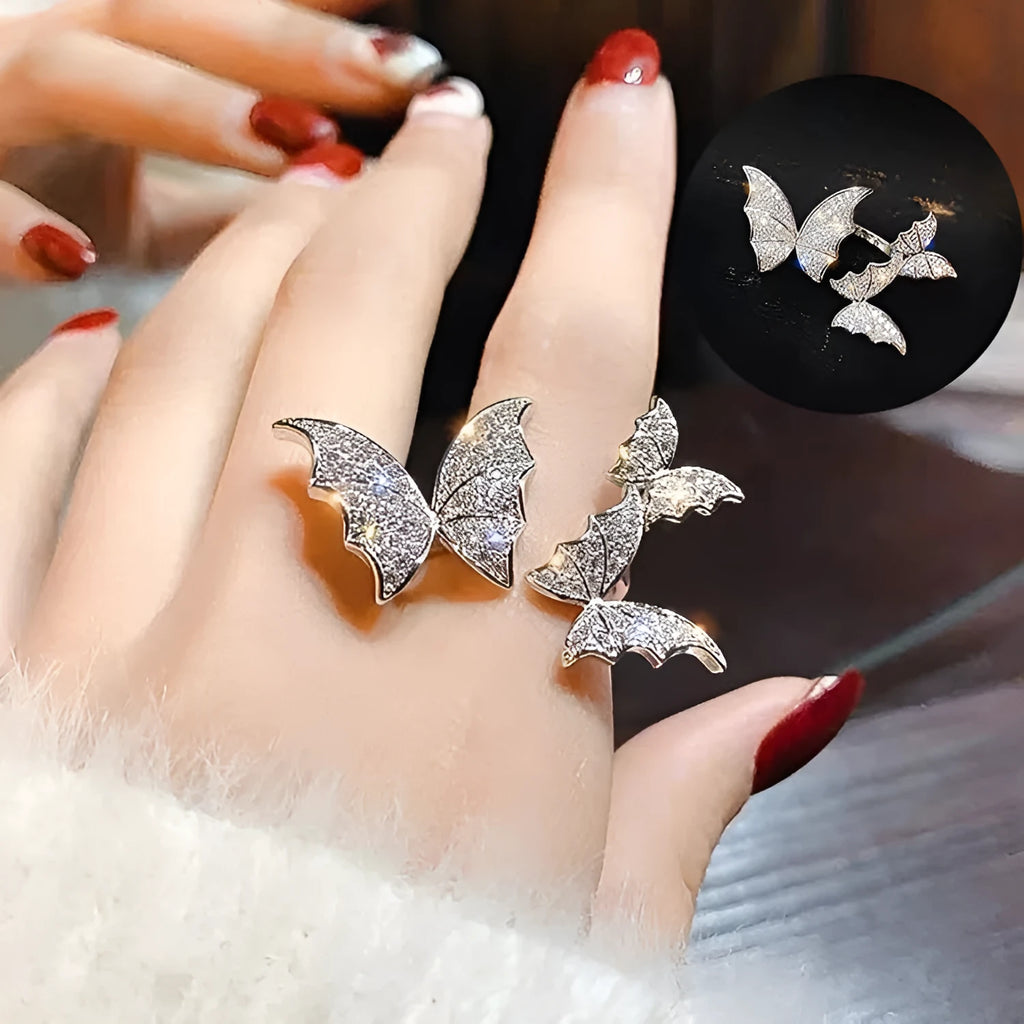Turnable anxiety ring with bead in rose gold finish, copper construction, adjustable opening, butterfly motif