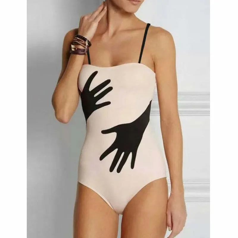 Women's one-piece bikini swimsuit with a gauze skirt, shown on a model.