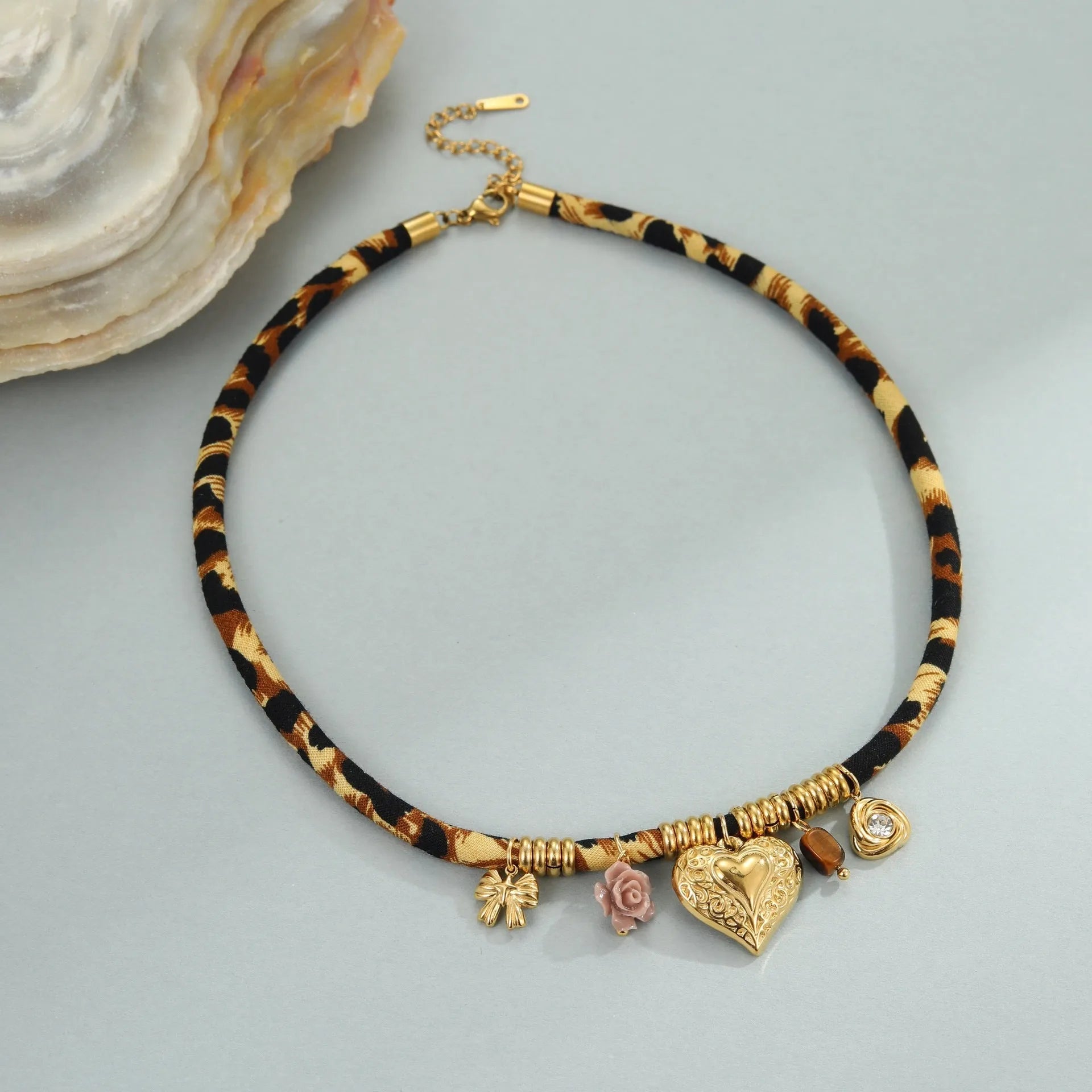 Women's stainless steel necklace with geometric leopard pendant on adjustable chain