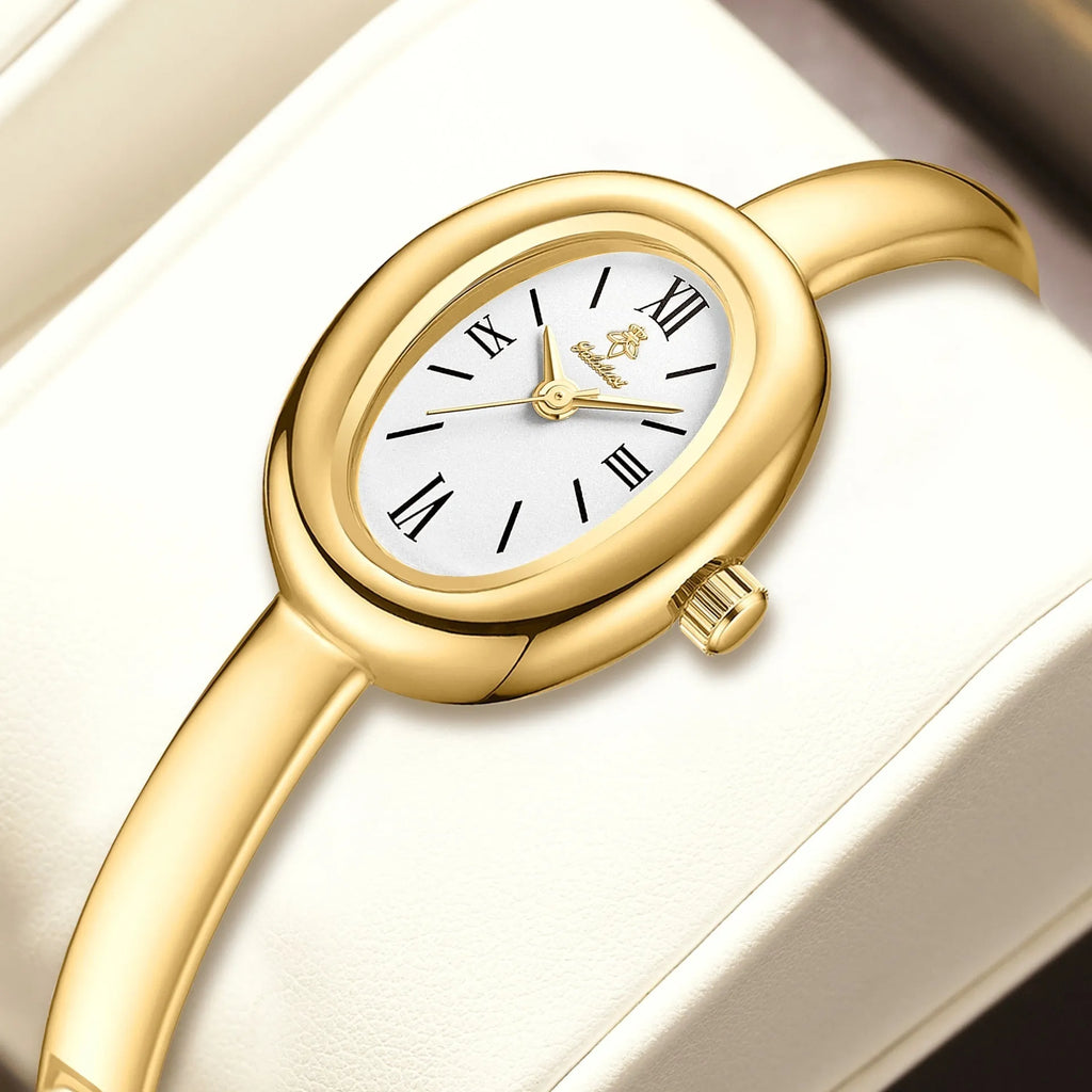 Women's multifunctional oval retro quartz watch in gold with spiral pattern dial and slim case